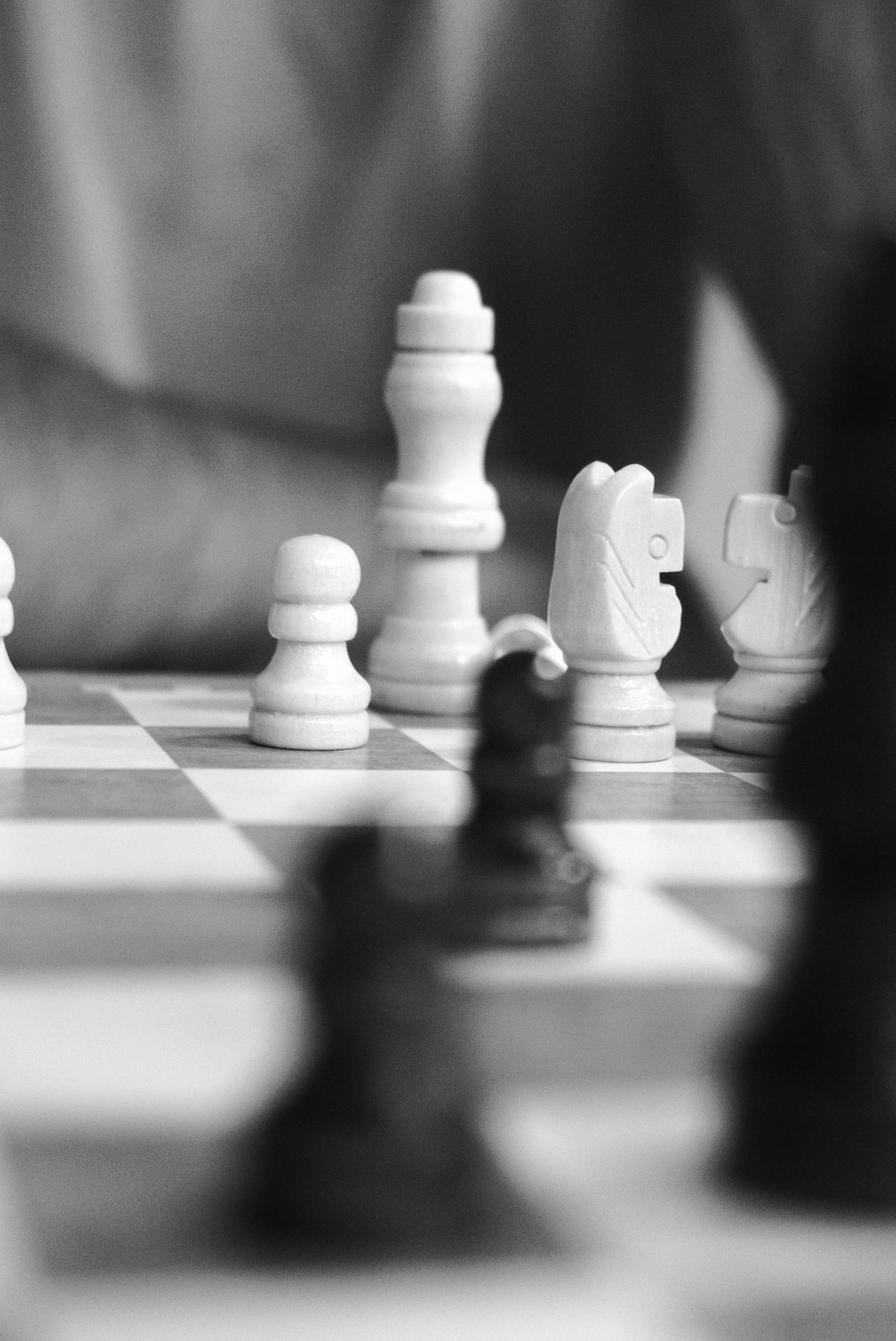 Strategic chess game symbolising complex family office advisory services and financial planning.